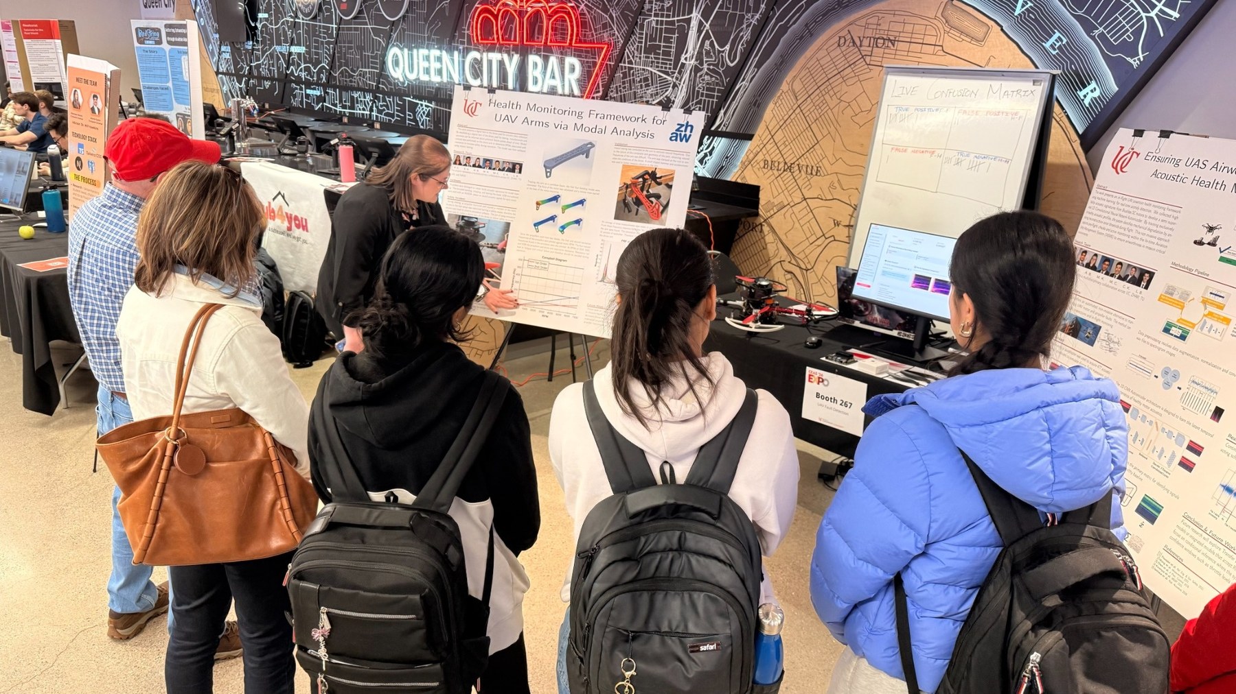 Students engaging with Senior Design projects at an expo