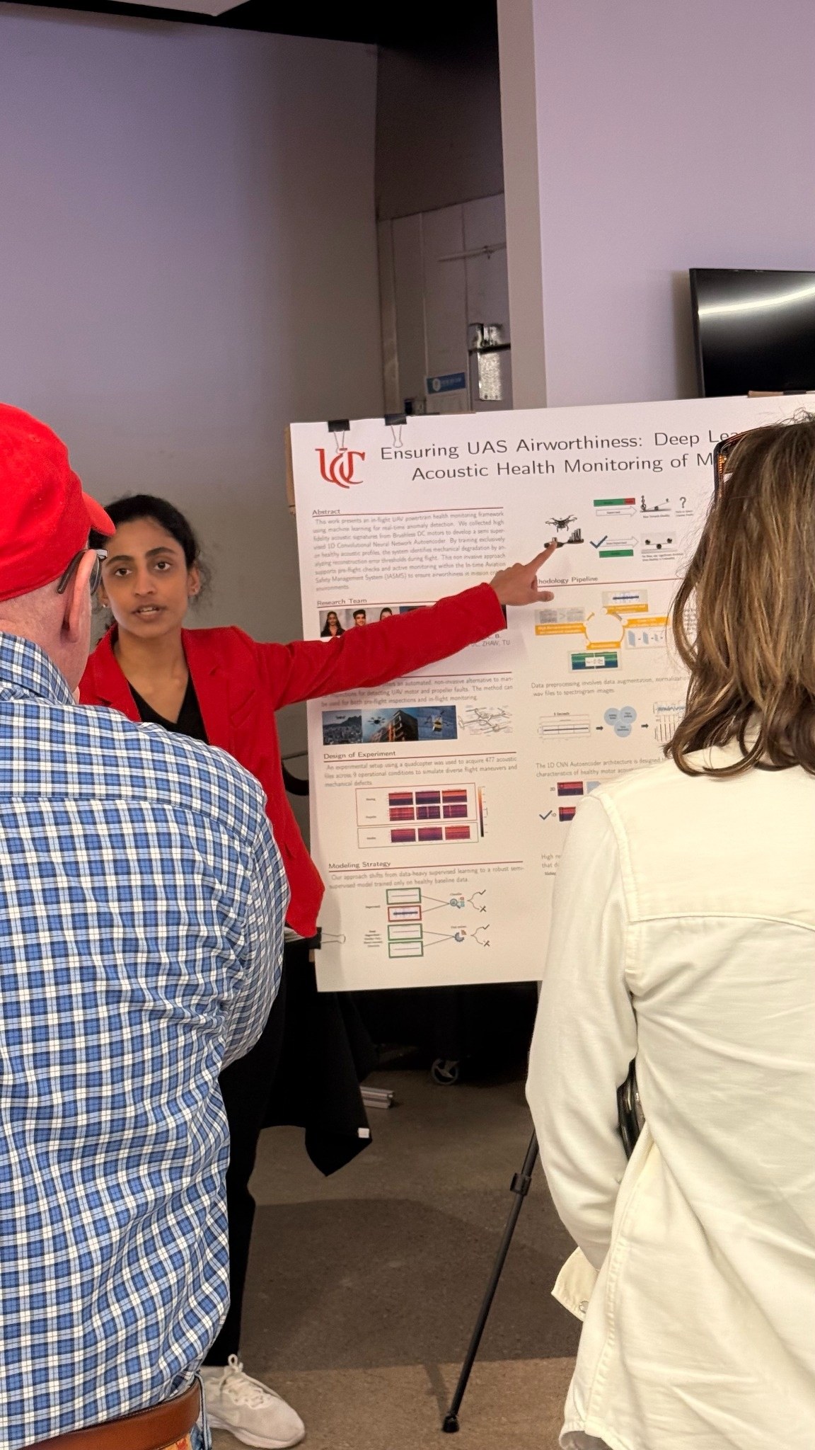 Student presenting technical Senior Design work